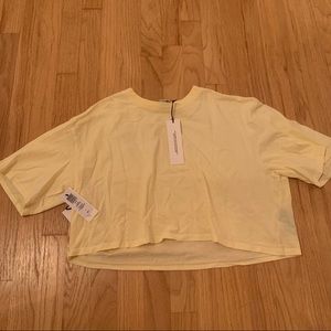 NWOT Aritzia tna tour cropped t shirt Gd butter yellow
